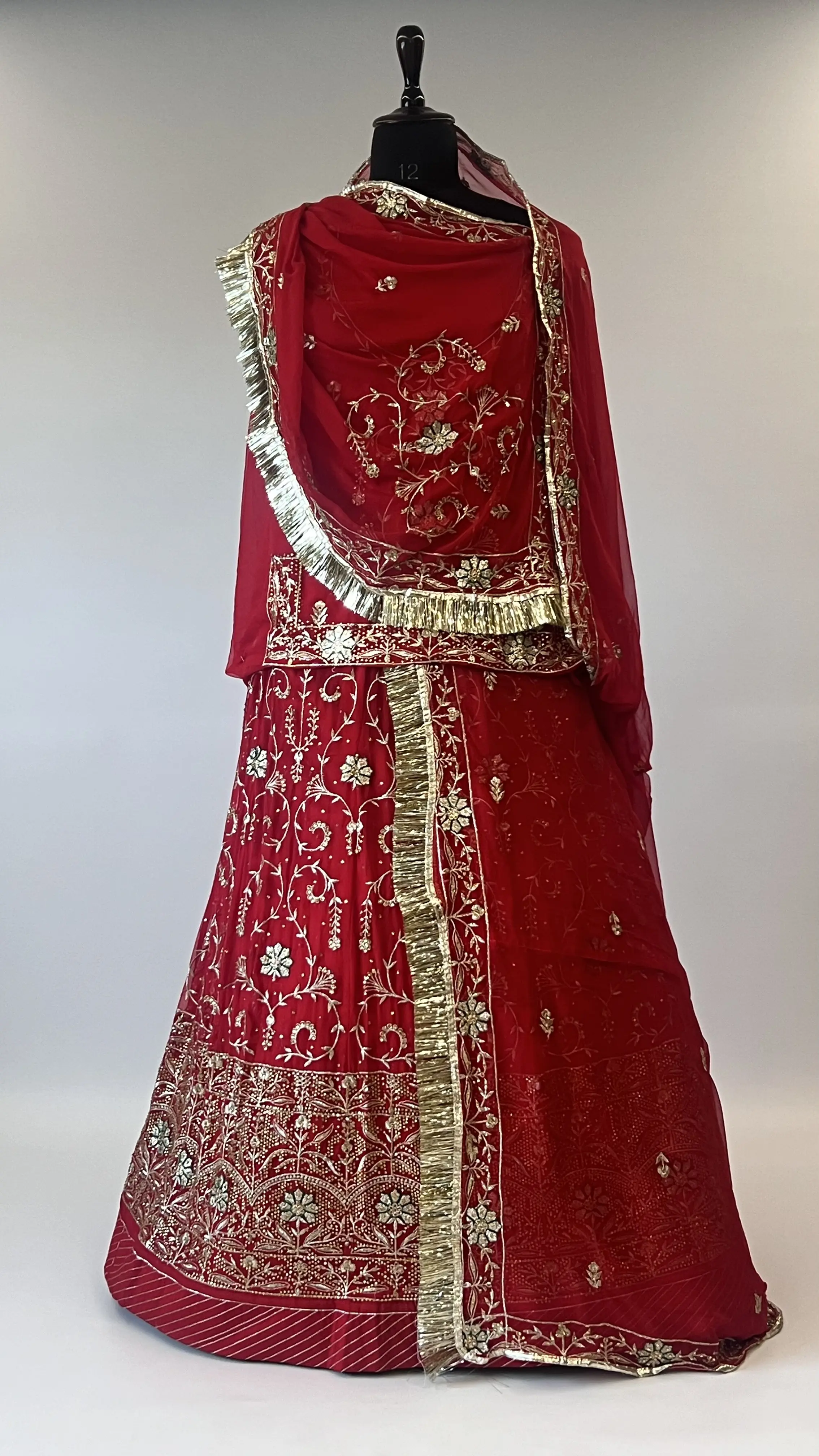 Shreeradheyposhak Kundan Rajtilak Lehenga Set